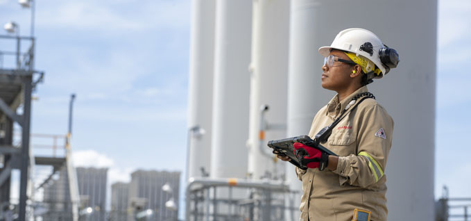 Female woman working wearing a safety hat